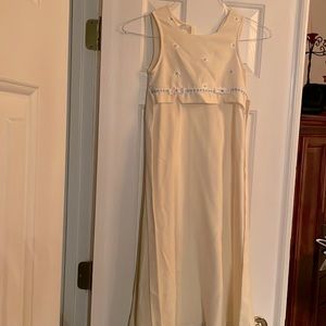 Bonnie Jean, size 7, yellow with pale pink flowers, rayon machine wash cold.